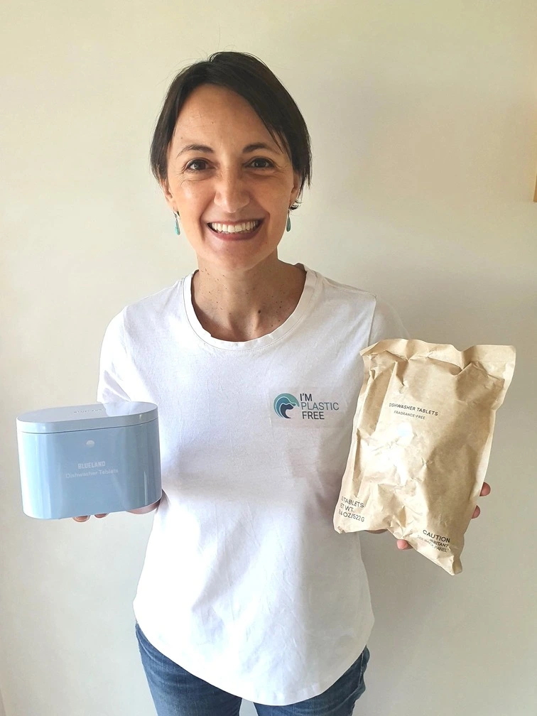Im-Plastic-Free-Simona Paganetto holding Blueland Plastic-Free Dishwasher Detergent